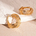 Geometric hollow stud earrings with twisted round design in gold or silver electroplated finish