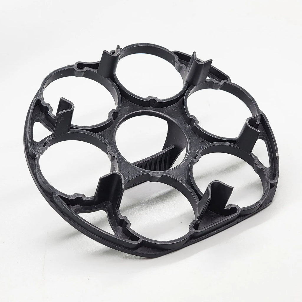 Black plastic egg holder keeper basket for kitchen storage, showing compact size.