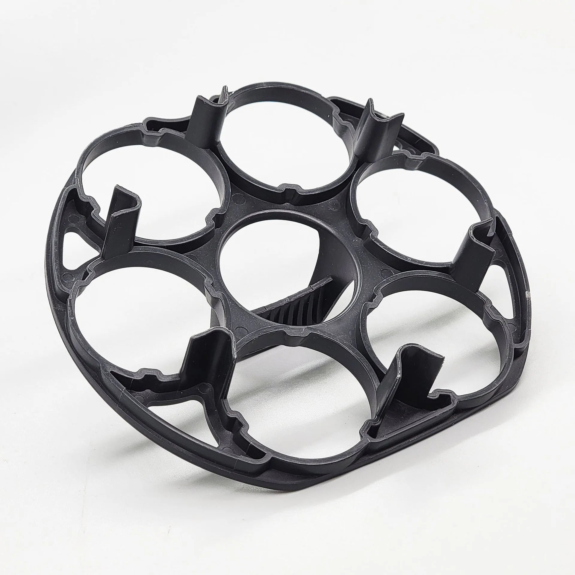 Black plastic egg holder keeper basket for kitchen storage, showing compact size.