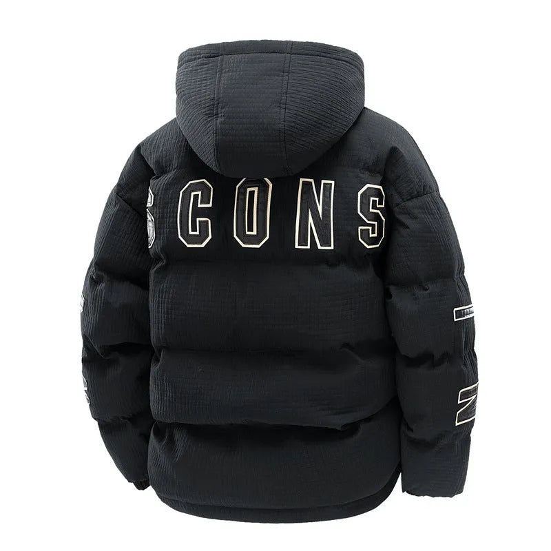 Man wearing a black hooded winter coat with letter print and side pockets, styled as a Korean cardigan.