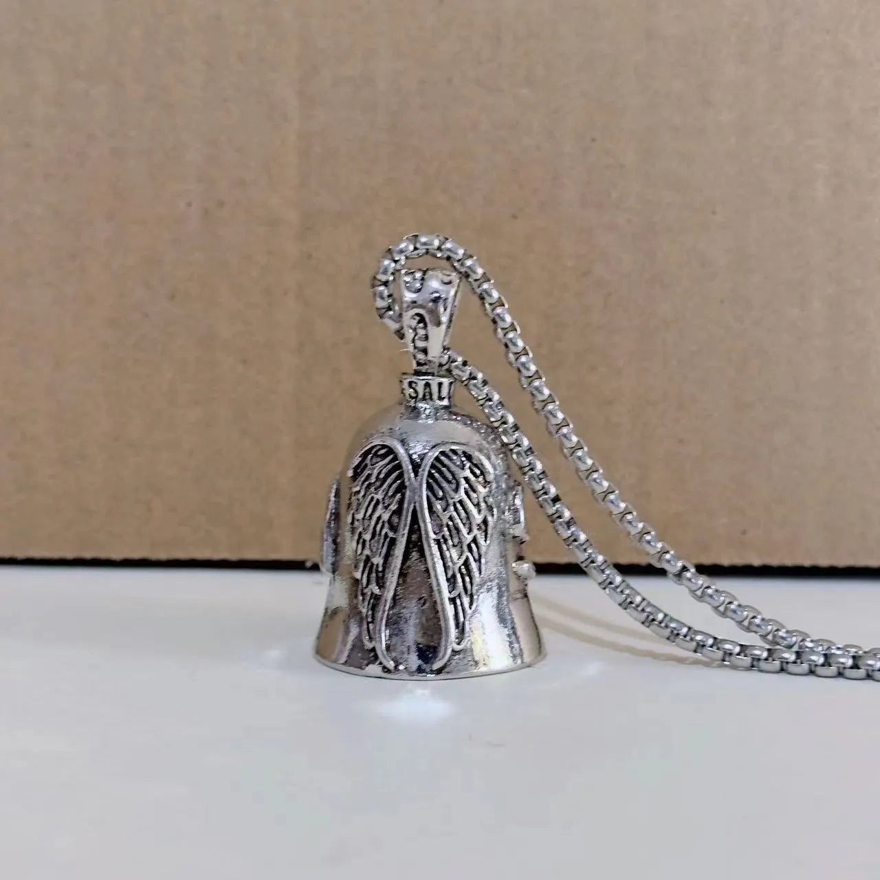 Vintage white angel feather pendant on alloy keychain and necklace.