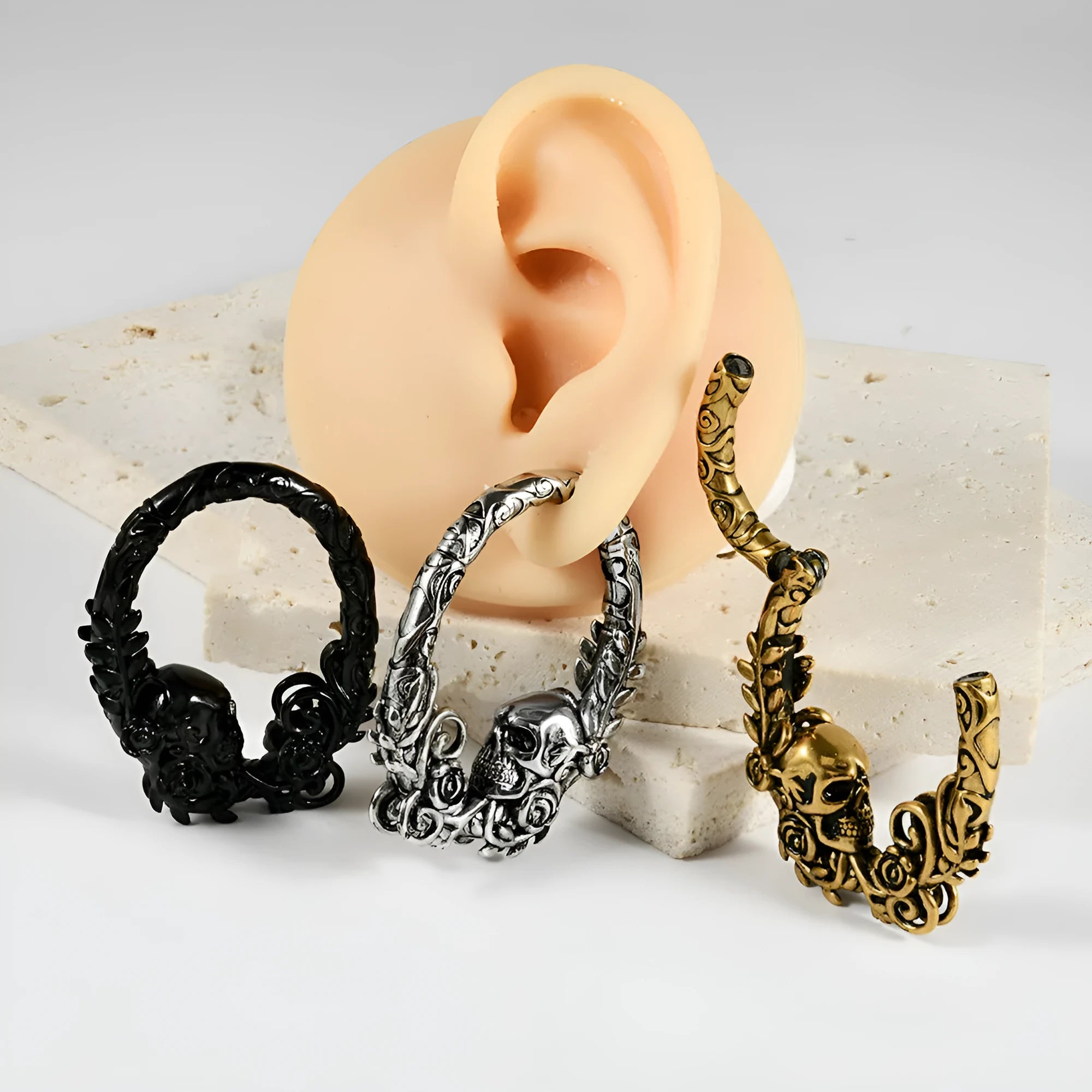 Stainless steel fashion earrings with totem pattern design in electroplated finish showing colour variation options