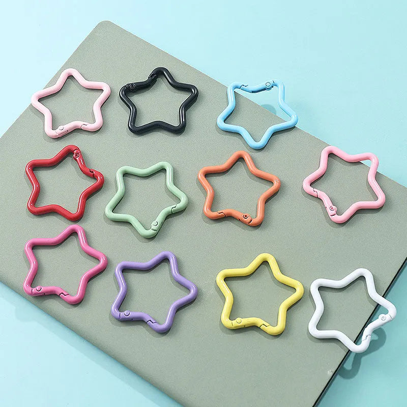 Zinc alloy five-pointed star keychain in light pink colour for backpack decoration