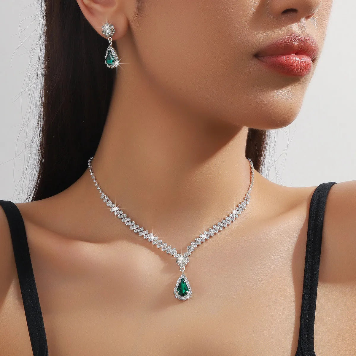 Claw chain necklace and earrings set with rhinestone water drops in multiple colour options
