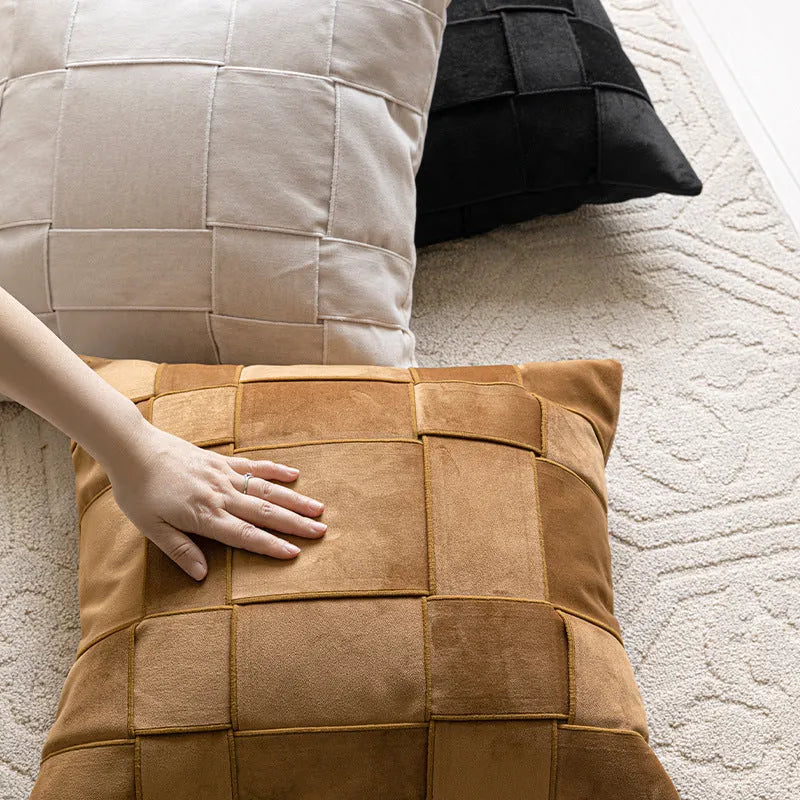 50cm square chenille woven pillow cushion in a choice of seven colours on a sofa.