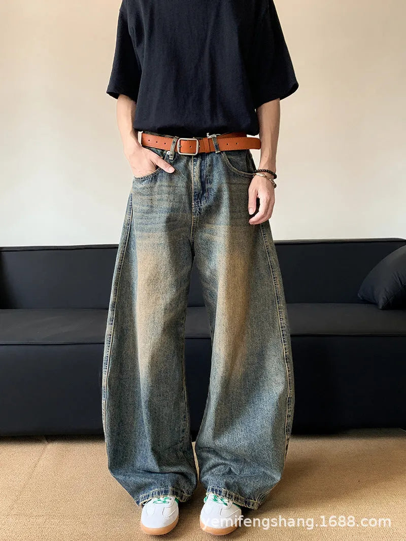 Men's retro blue distressed jeans with wide-leg cut and micro-elastic cotton blend fabric