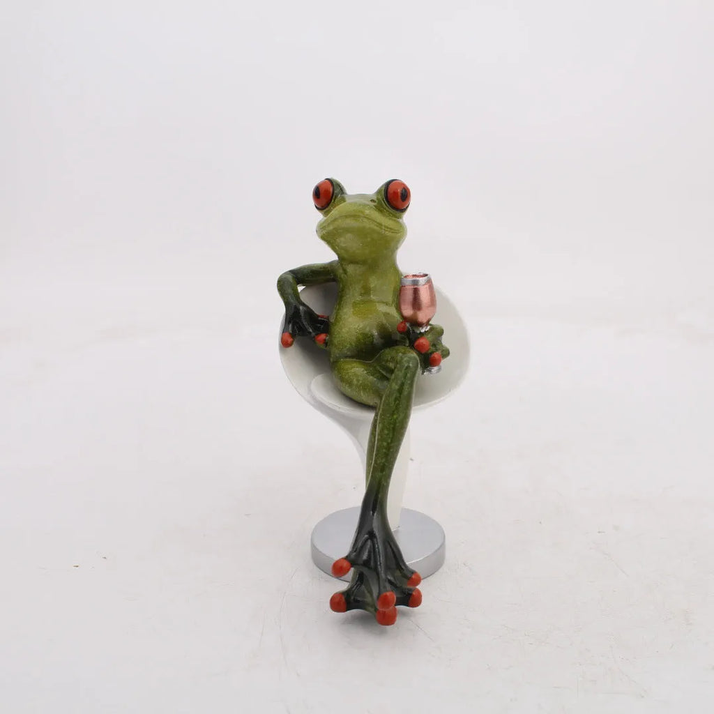 Pastoral style green resin frog decoration figurine on a wooden shelf.