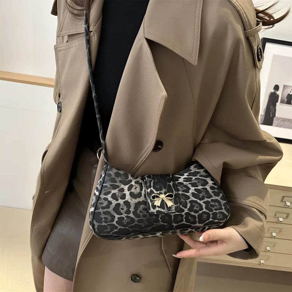 Women's casual PU leather handbag showing sandwich pocket design and available colour options