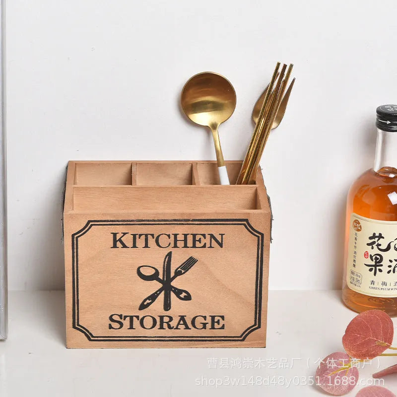 Wooden kitchen storage box for knives, forks, and chopsticks with internal dividers.