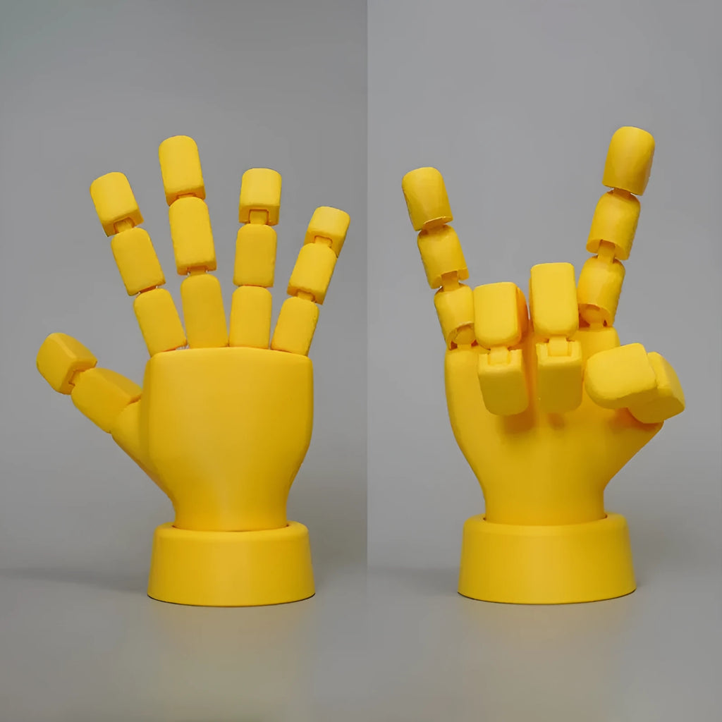 Yellow articulated hand props with movable joints measuring 5x5.38x7.5cm