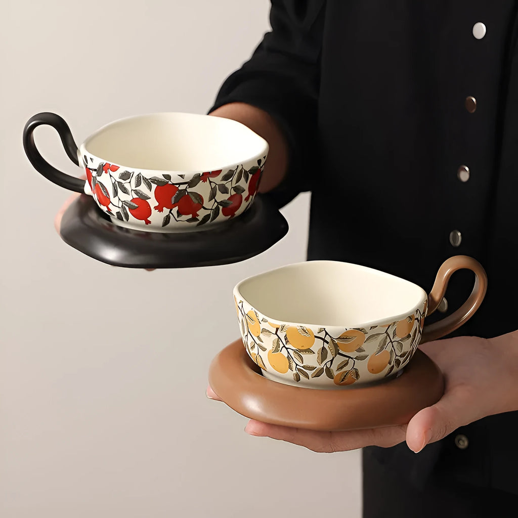 Retro ceramic coffee cup and saucer set in black or orange with medieval design