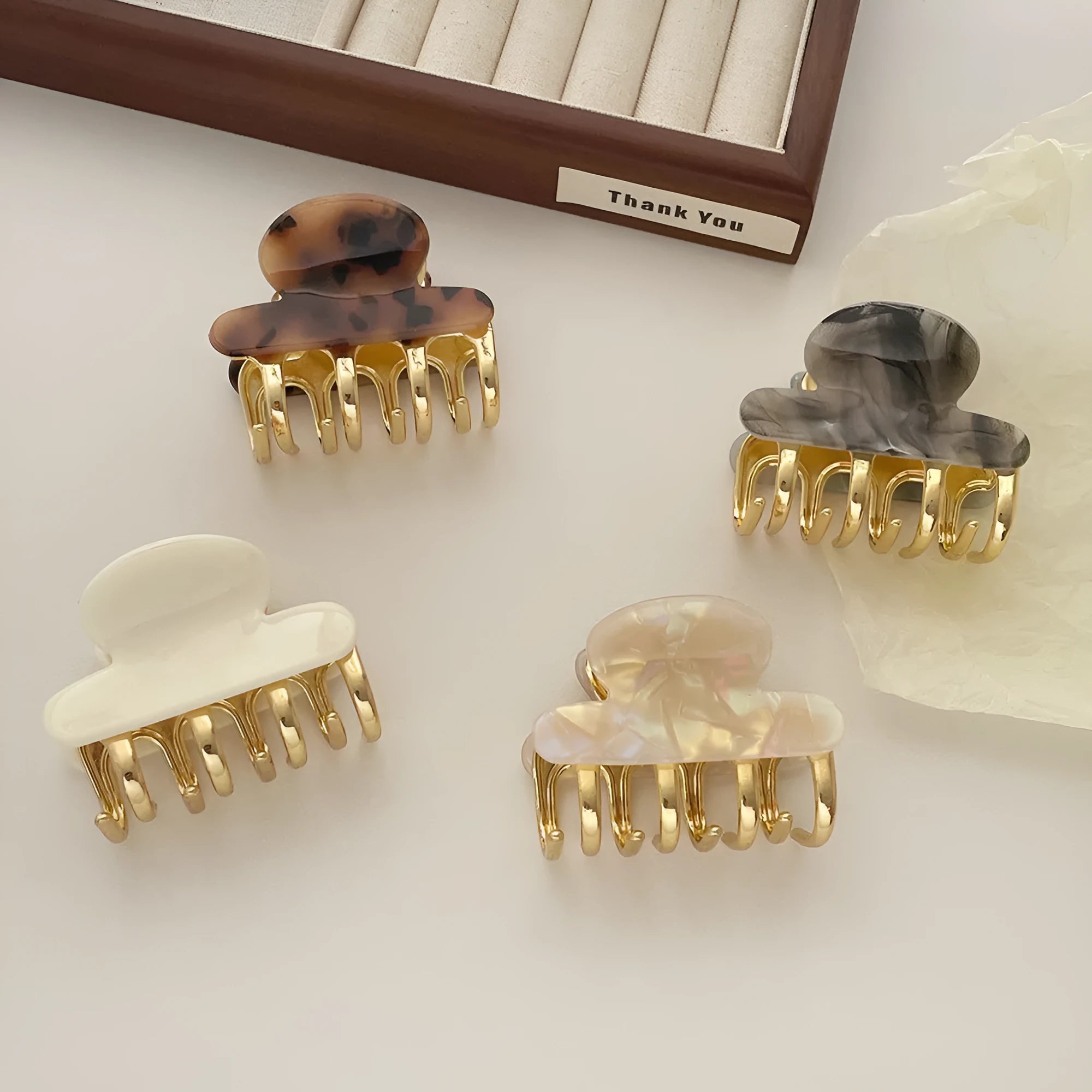 Women's retro acetate hair barrettes with metal grip in medium size showing four R08 colour options