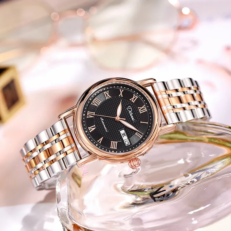 Women's automatic mechanical watch with 12mm thick case on a stainless steel bracelet with a white dial.