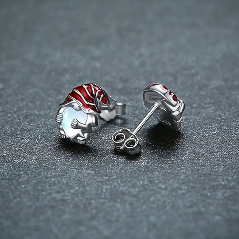 Women's Santa Claus heart shaped earrings in a white gold colour on a copper base.