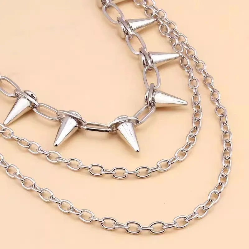 Silver metal punk pants chain, 115cm long, shown fastened to a pair of jeans.