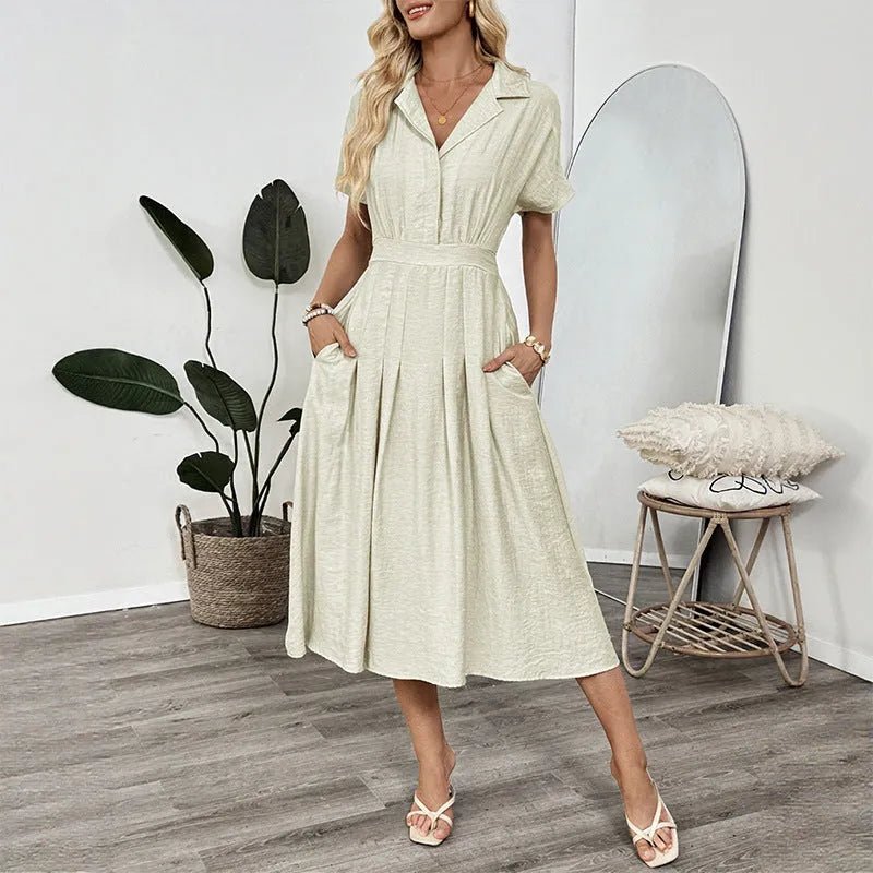 Light green twill lapel shirt dress with waist tie and splicing detail on a mannequin