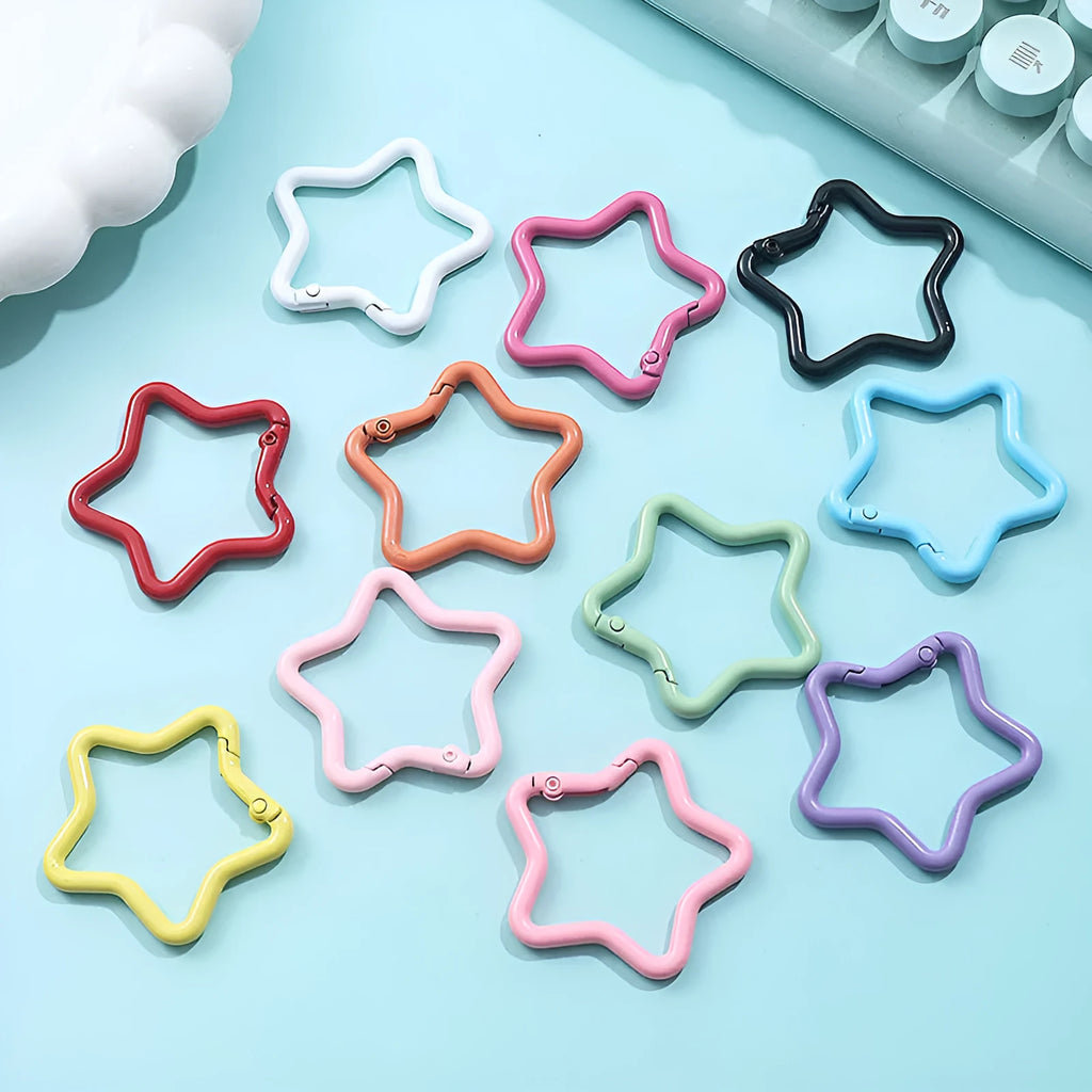 Zinc alloy five-pointed star keychain in light pink colour for backpack decoration