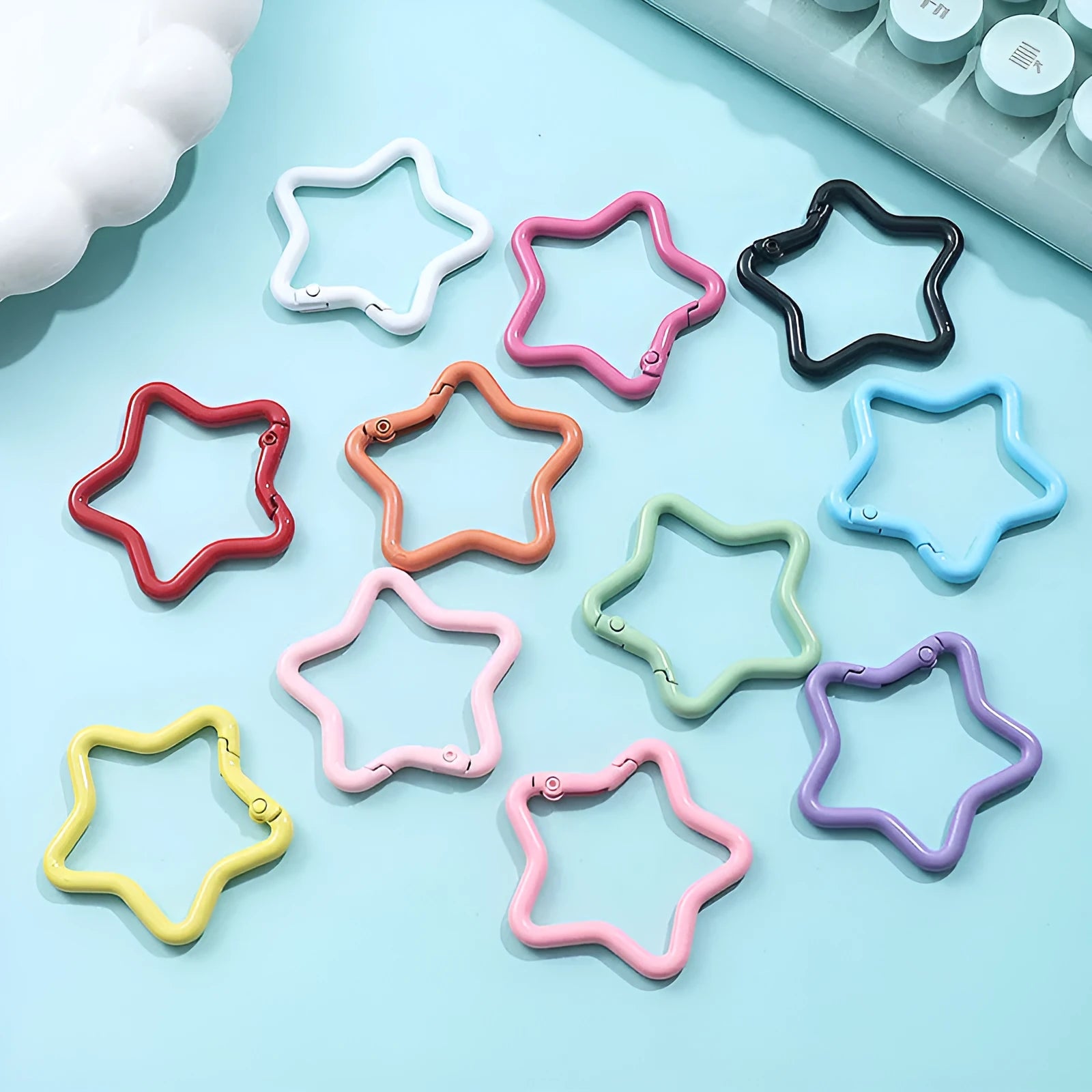 Zinc alloy five-pointed star keychain in light pink colour for backpack decoration