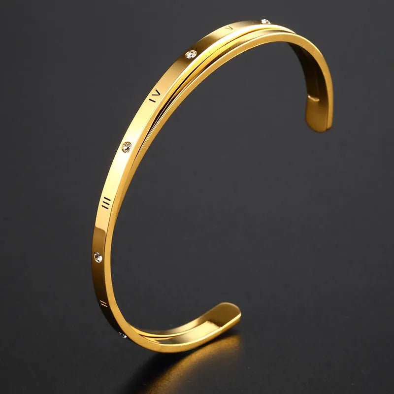 Open-ended women's bracelet with zircon stones and love heart element in rose gold finish