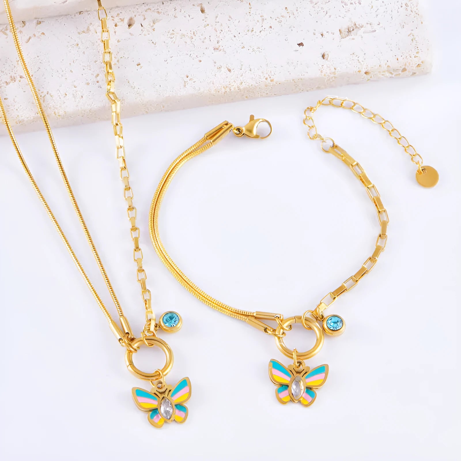Gold titanium steel butterfly necklace and bracelet set with epoxy colour detailing on animal zodiac pendant