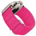 Elastic nylon Apple Watch replacement band with stainless steel buckle in various colours.