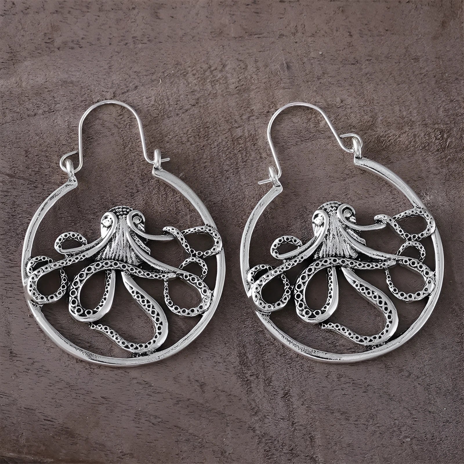 Vintage octopus earrings in antique silver colour with detailed animal zodiac design