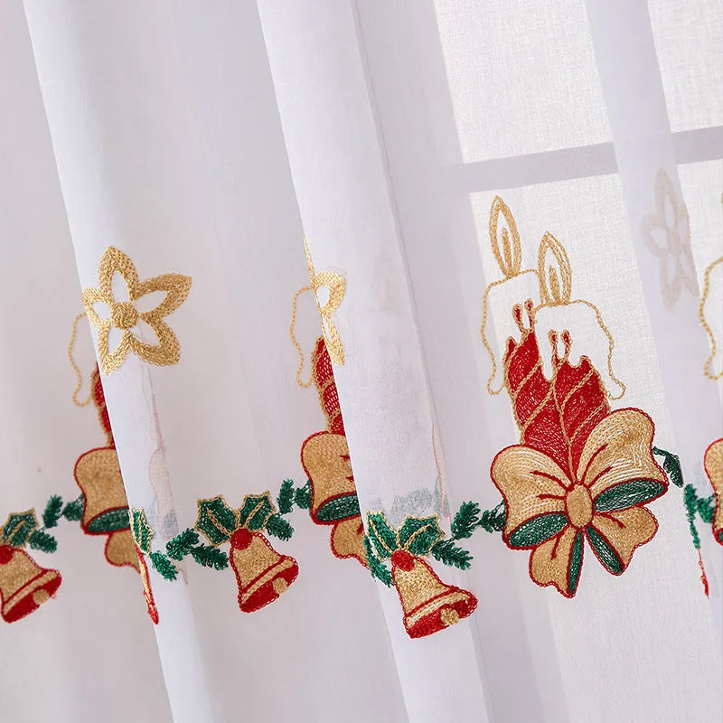 American Christmas curtain with white snowflake embroidery on red fabric, hanging as a pair.