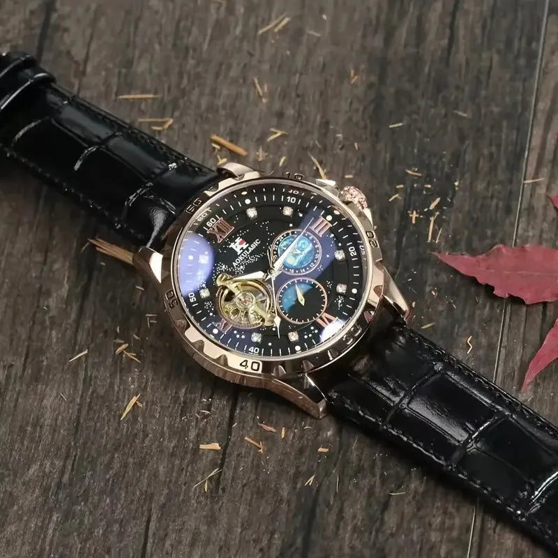 Men's automatic mechanical watch with hollow dial, rose gold case, black leather strap.