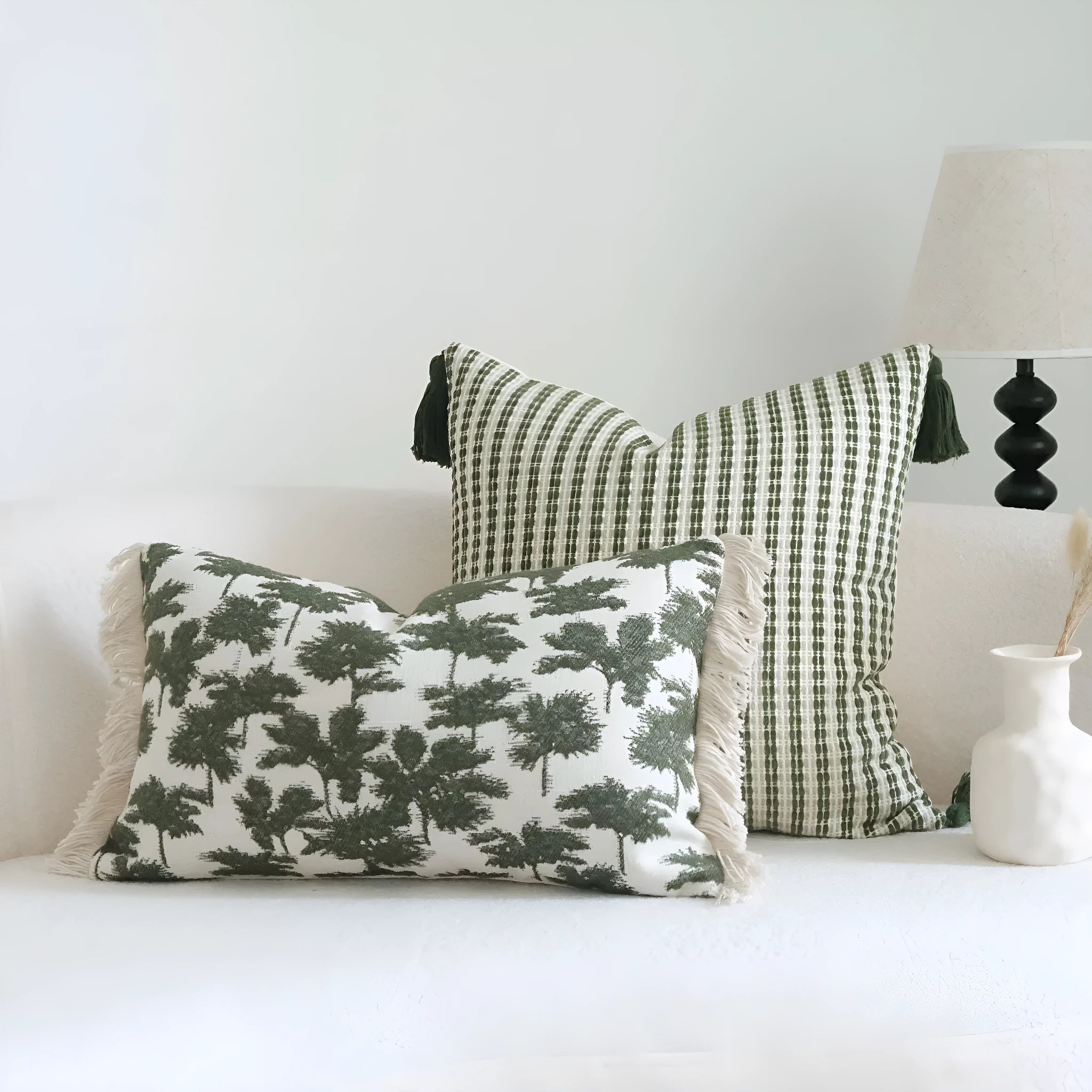 Green cotton and linen hotel sample pillow with silk floss filler in striped and botanical patterns