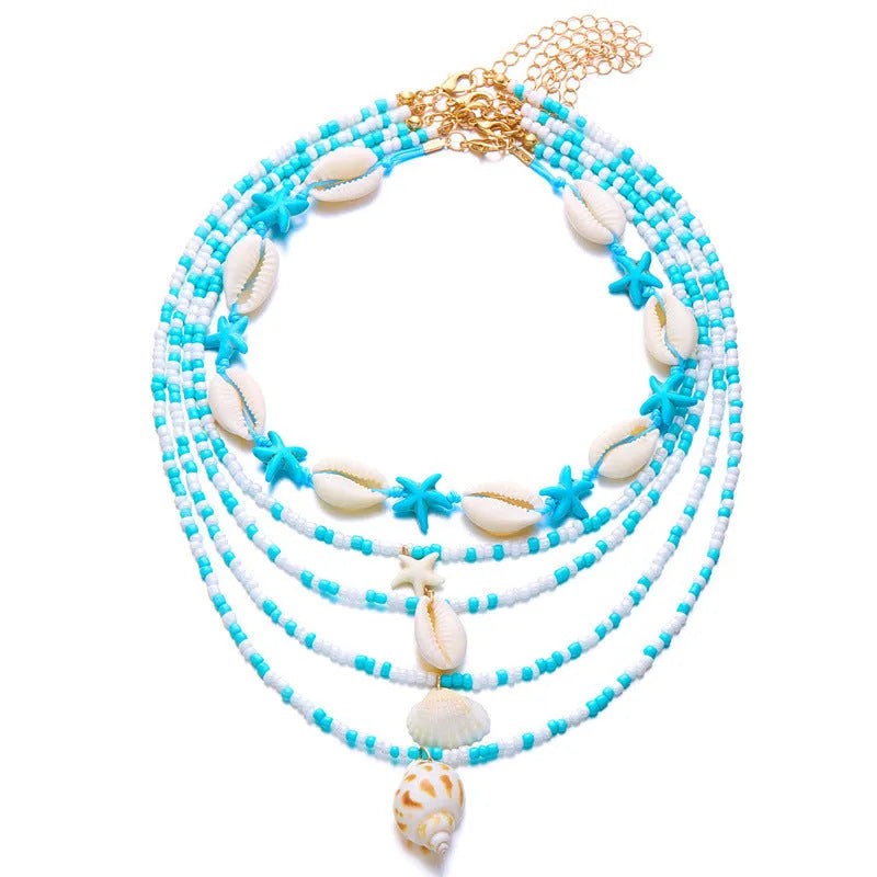 Five women's necklaces with shell and conch bead pendants on adjustable electroplated alloy chains
