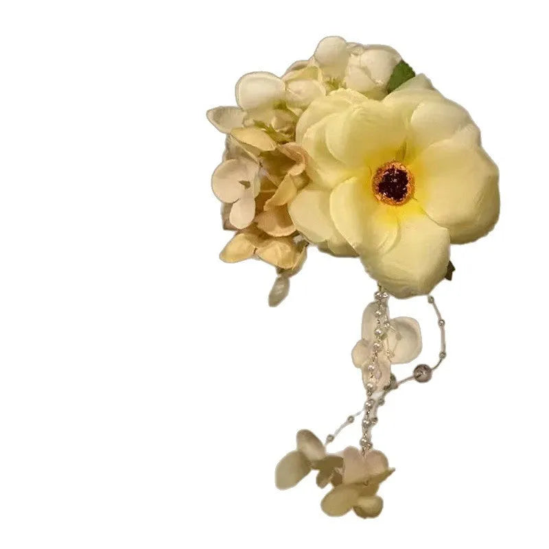 Linglan tassel side clip hair accessory with pearl and flower decorations in yellow colour