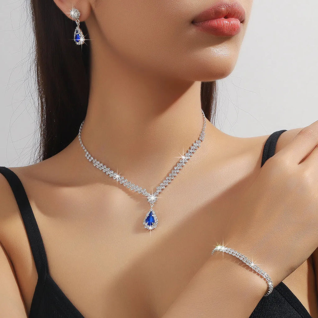 Claw chain necklace and earrings set with rhinestone water drops in multiple colour options