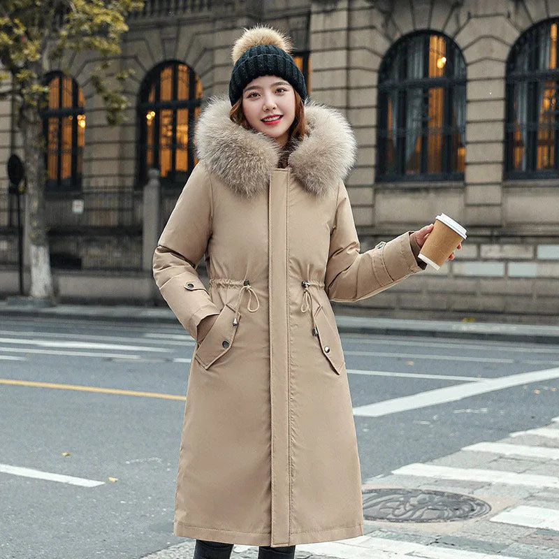 Women's long white fleece trench coat with cotton padding, showing elegant style and 100cm length.