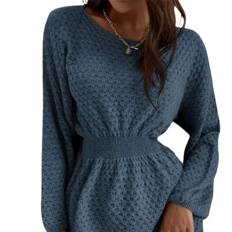 Blue women's knitted dress with French round neck, fitted waist, and hand-crocheted flower details