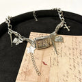 Dark multi-layer cross necklace with twin clavicle chains and adjustable 41-50cm length