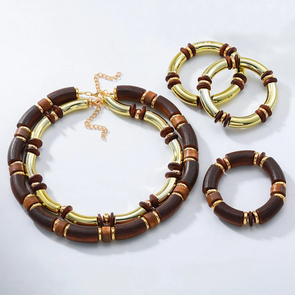 Women's multi-layer wooden necklace and bracelet set with circular alloy pendants