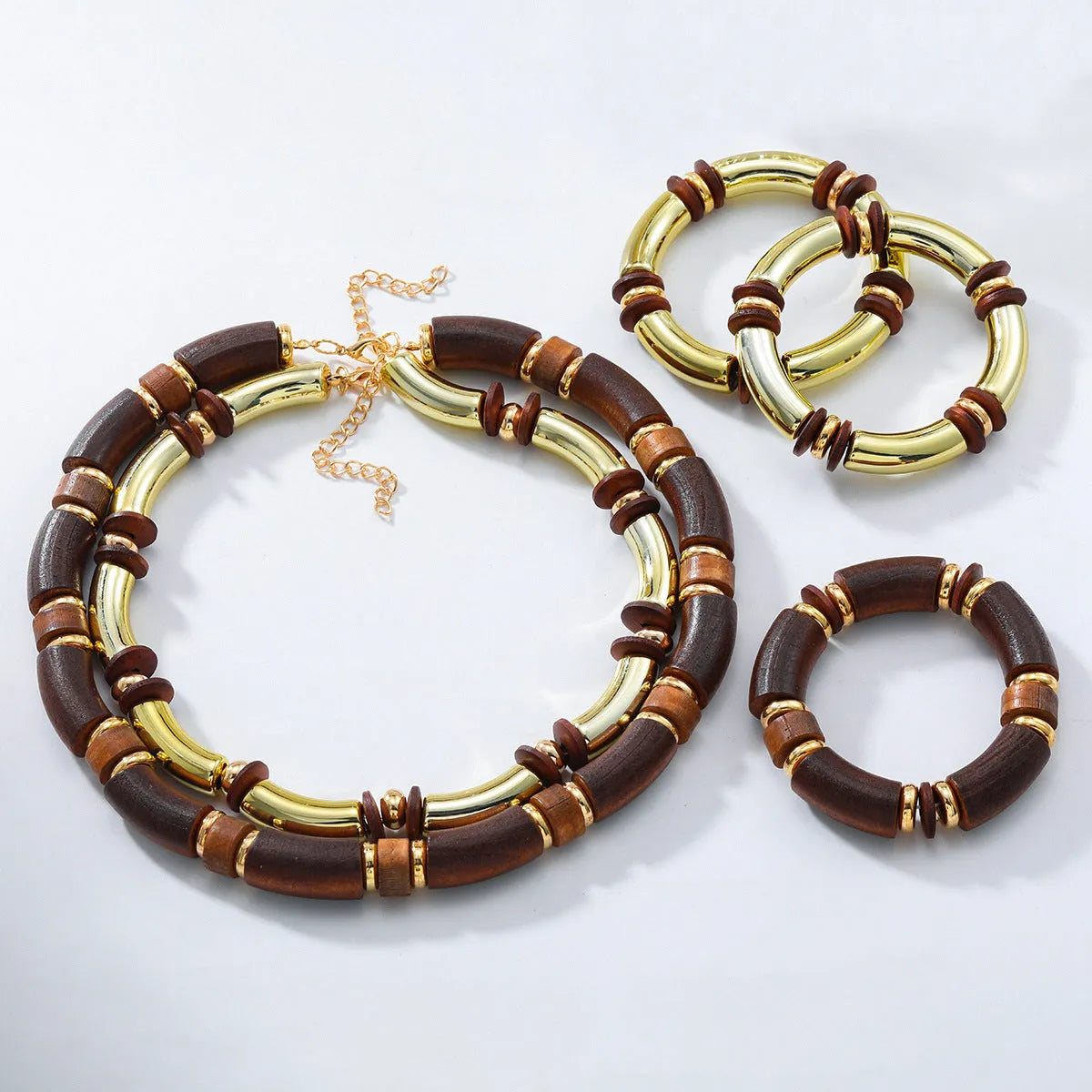 Women's multi-layer wooden necklace and bracelet set with circular alloy pendants