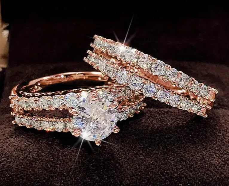 Two-piece fully jewelled female alloy ring set in geometric shapes, shown in gold, rose gold, and silver colour options.