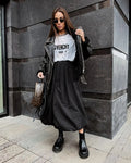 Women's long cotton skirt with elastic waistband in black solid colour