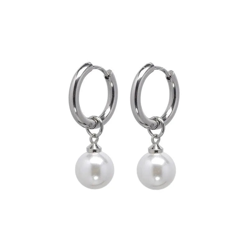 A pair of women's geometric alloy earrings with round pearl details and titanium steel posts.