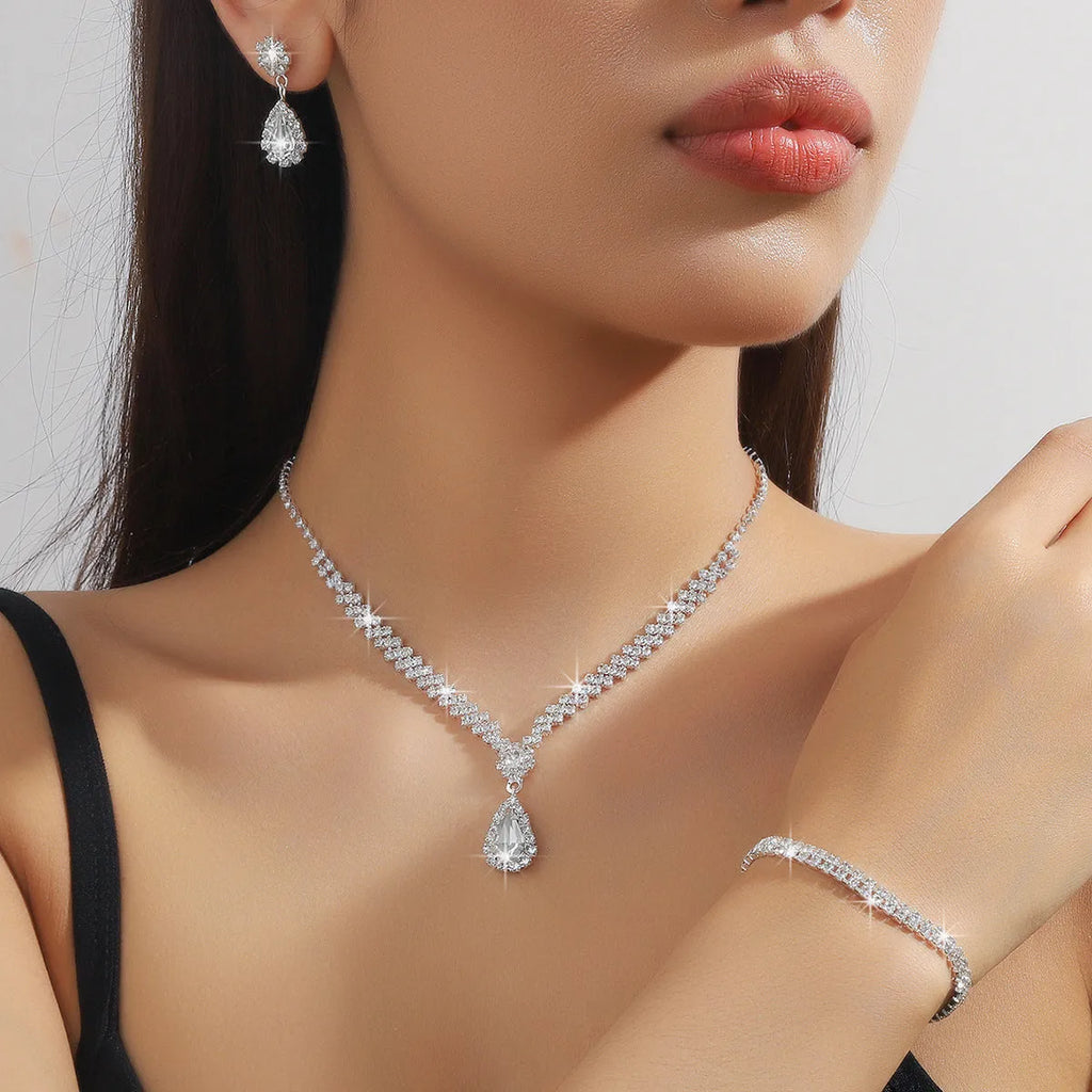 Claw chain necklace and earrings set with rhinestone water drops in multiple colour options