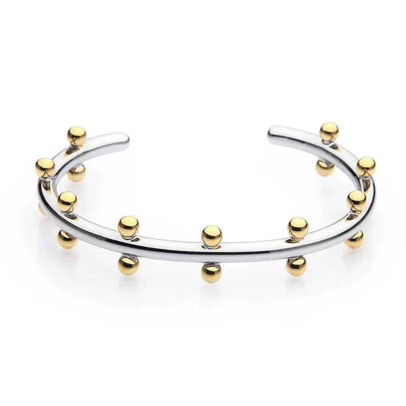 Stainless steel C-shaped bean bead charm with round rivet texture, shown in gold, steel, and steel gold colours.