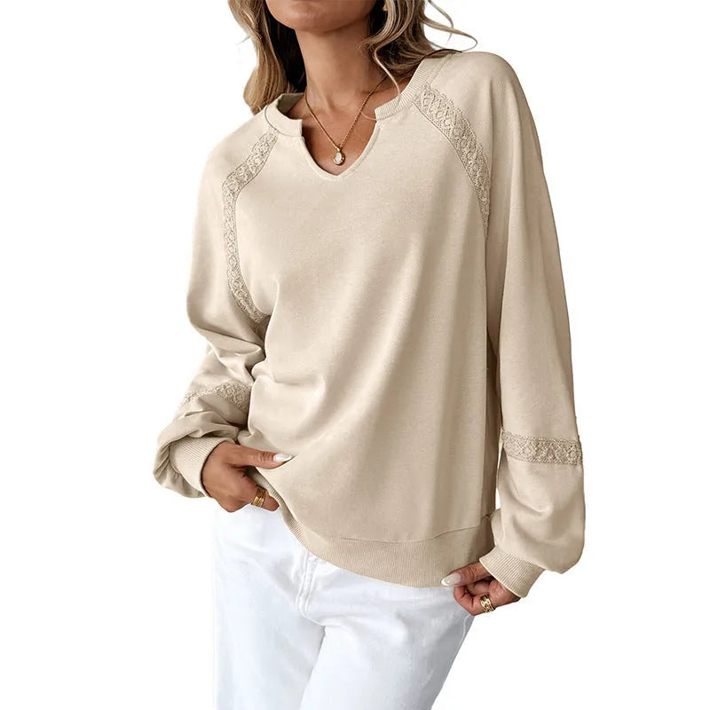 Women's solid colour half-open collar sweater with stitching lace detail and long sleeves in a loose fit.