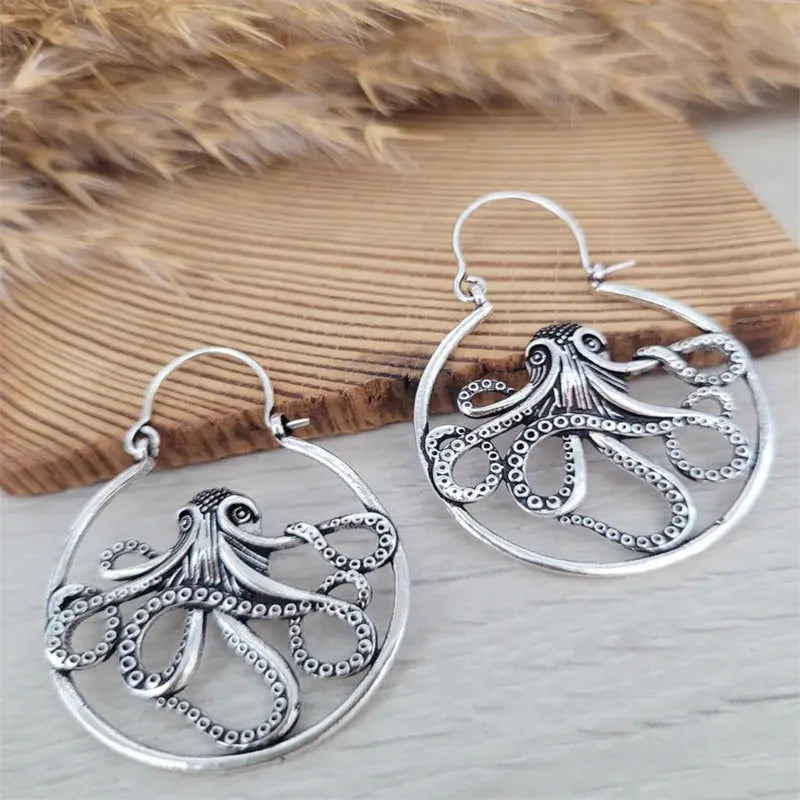 Vintage octopus earrings in antique silver colour with detailed animal zodiac design