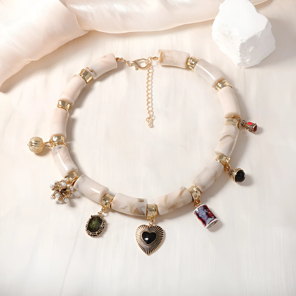Women's bamboo design resin heart necklace with electroplated finish on adjustable chain