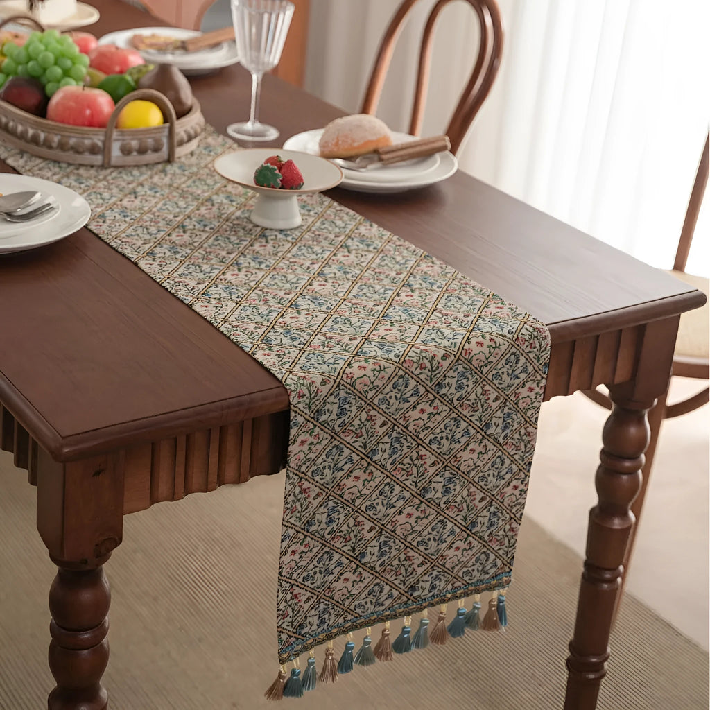 Rhyme Nordic Jacquard table runner with bouquet stripe pattern and tassel trim on dining table