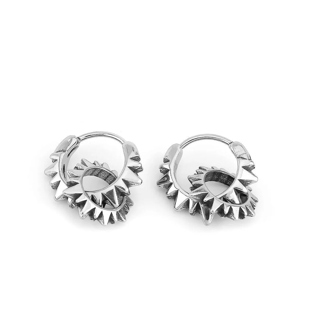 Polished stainless steel retro hoop earrings with round ring design in steel colour.