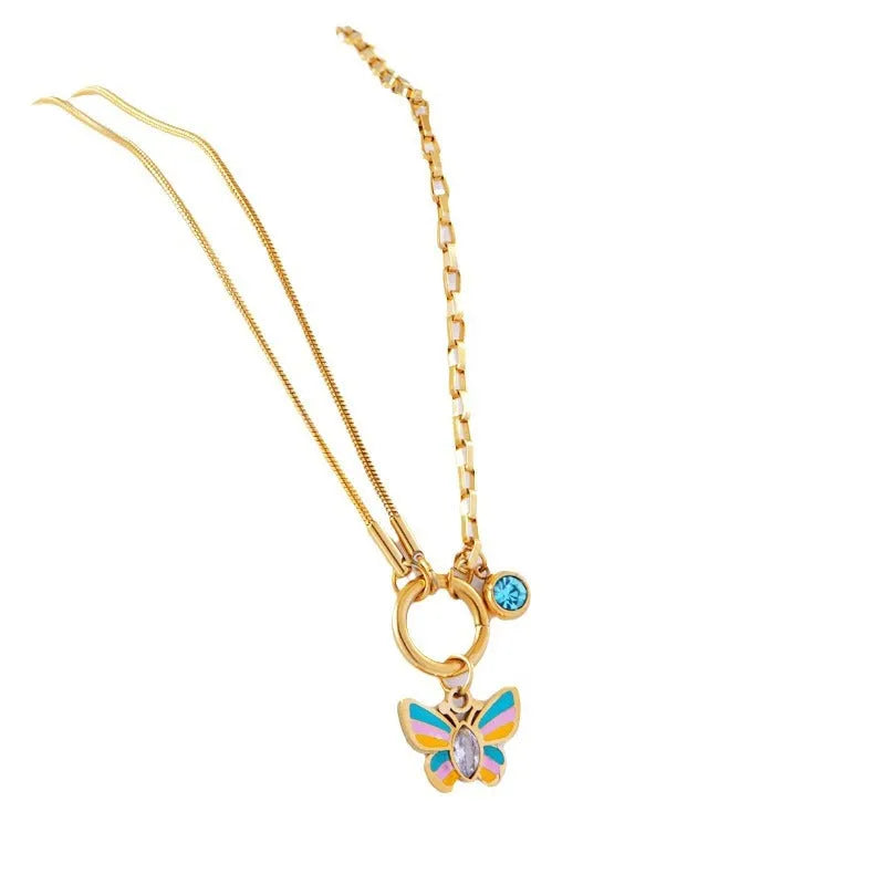 Gold titanium steel butterfly necklace and bracelet set with epoxy colour detailing on animal zodiac pendant