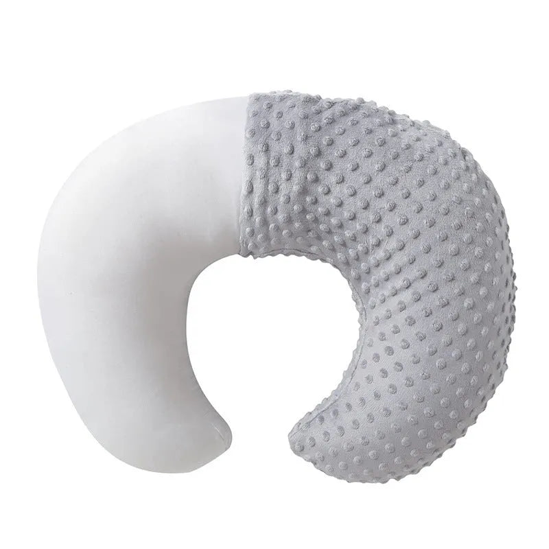 Nursing pillow with cotton-filled support and washable polyester cover in choice of colours