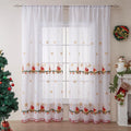American Christmas curtain with white snowflake embroidery on red fabric, hanging as a pair.